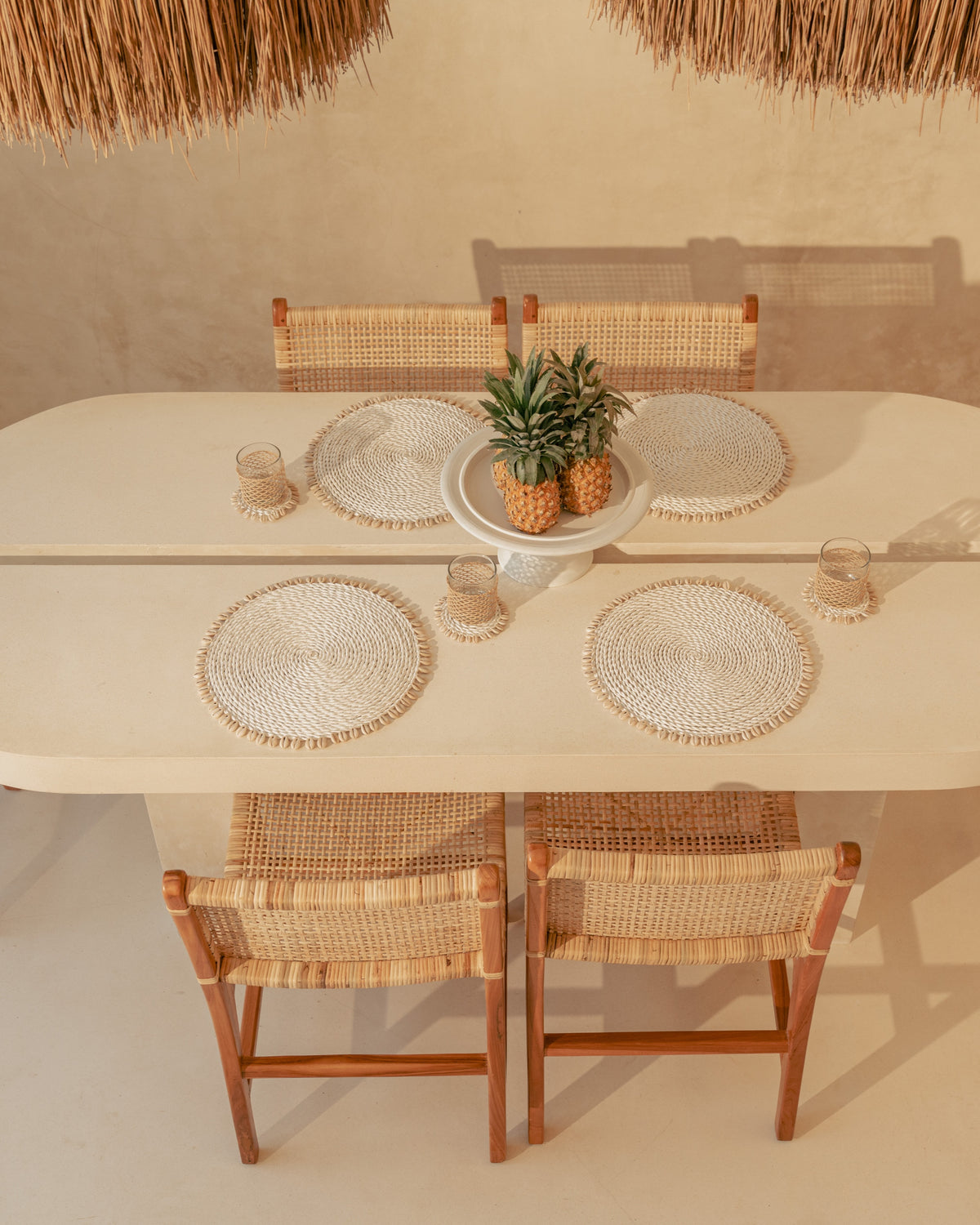 White Rattan Woven Placemats with Shell Fringe Feature Design