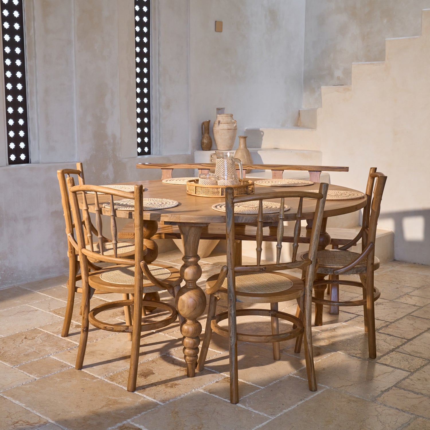 Desa Round Carved Teak Dining Chair with Woven Rattan Seat Panel