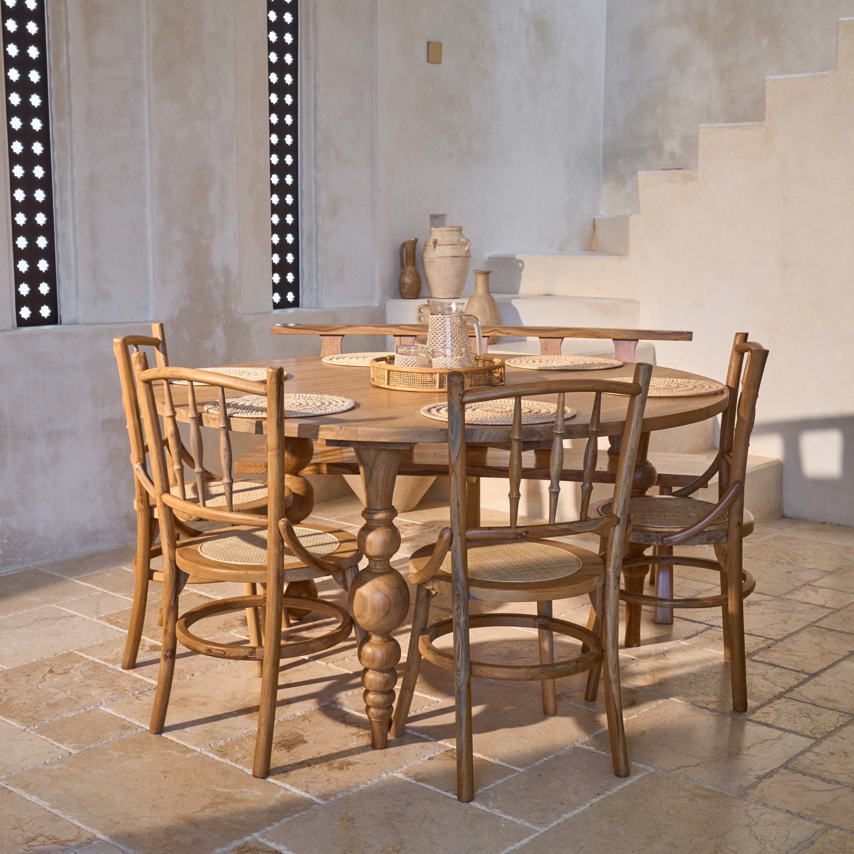 Desa Round Carved Teak Dining Chair with Woven Rattan Seat Panel