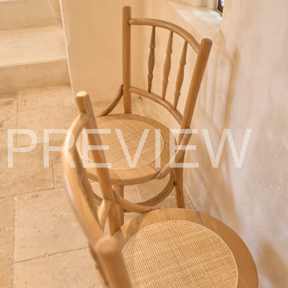 Desa Round Carved Teak Dining Chair with Woven Rattan Seat Panel