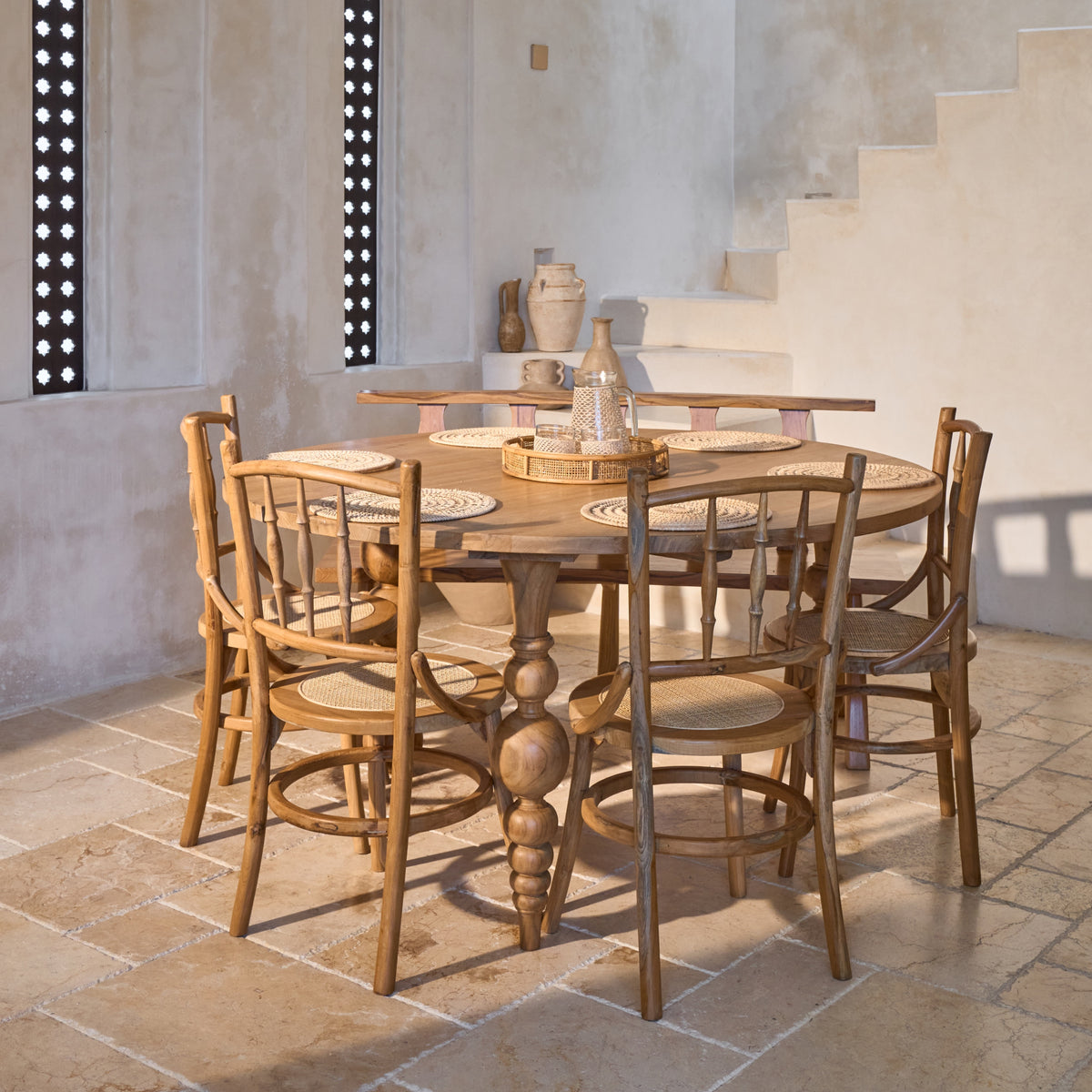 Desa Round Carved Teak Dining Chair with Woven Rattan Seat Panel